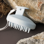 Rhythm of the Rain : Brosse de Massage Relaxante pour le Cuir Chevelu